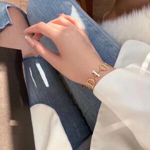 Gold Bracelet with Charms